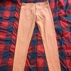 Peach colored leggings